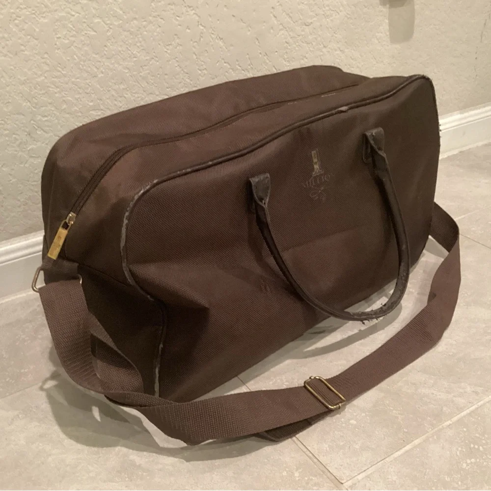 Paco Rabanne Brown Duffel Bag with Structured Design and Top Handles